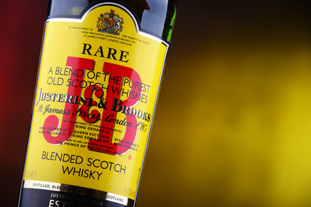 POZNAN, POL - DEC 12, 2018: Bottle of J&B Rare blended Scotch whisky, a product of Justerini & Brooks Ltd. fine wine and spirits merchant who have been supplying to every British monarch since 1761のeditorial素材
