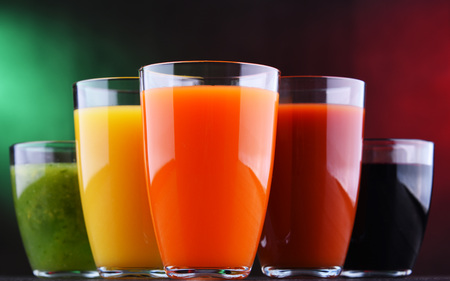 Glasses with fresh organic vegetable and fruit juices. Detox dietの写真素材