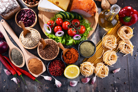 Composition with assorted organic food products on the table.の写真素材