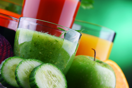Glasses with fresh organic vegetable and fruit juices. Detox dietの写真素材
