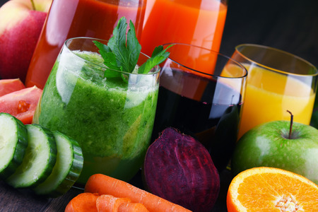 Glasses with fresh organic vegetable and fruit juices. Detox dietの写真素材