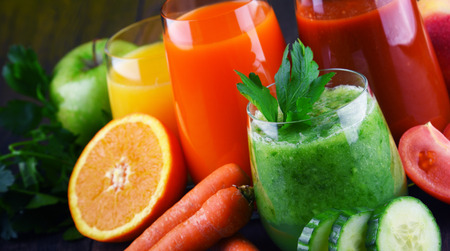 Glasses with fresh organic vegetable and fruit juices. Detox dietの写真素材