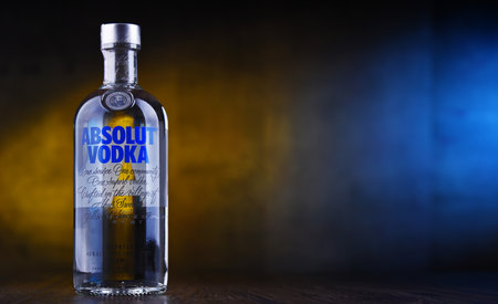 POZNAN, POL - MAAR 22, 2019: Bottle of Absolut Vodka, a brand of vodka produced in Sweden. Owned by French group Pernod Ricard it is one of the largest brand of alcoholic spirits in the worldのeditorial素材