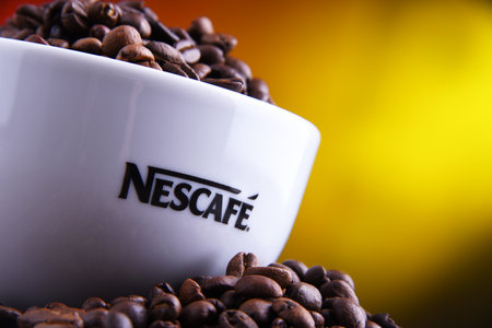 POZNAN, POLAND - MAR 29, 2019: Cup of Nescafe coffee, a brand of Swiss coffee made by Nestle and introduced in 1938のeditorial素材