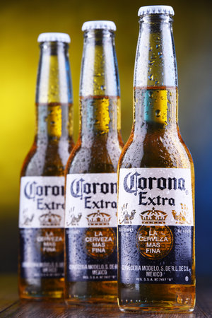 POZNAN, POL - MAR 28, 2019: Bottles of Corona Extra, one of the top-selling beers worldwide, a pale lager produced by Cerveceria Modelo in Mexicoのeditorial素材