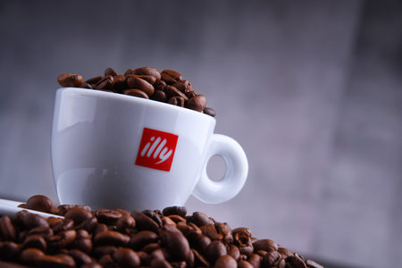 POZNAN, POL - MAR 29, 2019: Cup of Illy coffee, a brand of Italian coffee roasting company that...