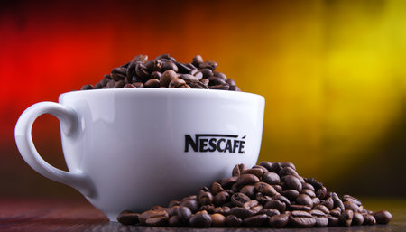 POZNAN, POLAND - MAR 29, 2019: Cup of Nescafe coffee, a brand of Swiss coffee made by Nestle and introduced in 1938のeditorial素材