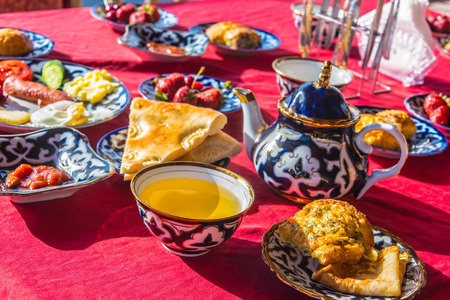 Traditional Uzbek breakfast served on the terrace.の写真素材