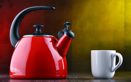 Traditional stainless steel stovetop kettle with whistle of two litres capacityの写真素材