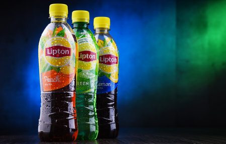POZNAN, POL - JUN 5, 2019: Plastic bottles of Lipton Ice Tea, a soft drink brand sold by Lipton and belonging to Unilever, a British-Dutch multinational consumer goods company.のeditorial素材