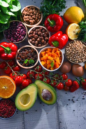 Composition with assorted organic food products on wooden kitchen tableの写真素材