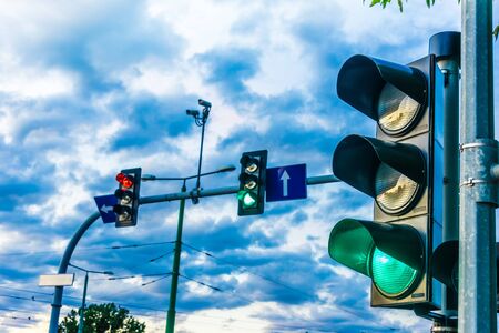 Traffic lights over urban intersection. Green lightの写真素材
