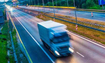 Trucks on four lane controlled-access highway in Poland.