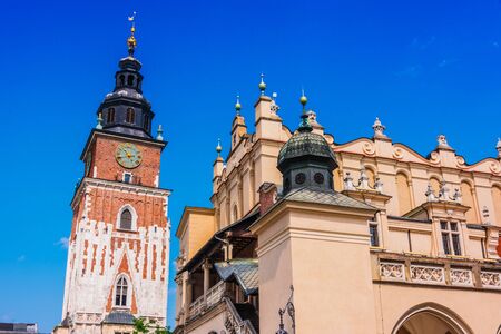 Main Market Square with Town Hall Tower and Cloth Hall in Old Town of Krakow, Polandの写真素材