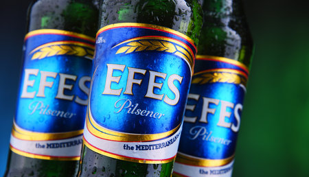 POZNAN, POLAND - AUG 22, 2019: Bottles of Efes Pilsener, the flagship beer of Anadolu Efes company Headquartered in Istanbul, Turkeyのeditorial素材