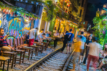 HANOI, VIETNAM - SEP 9, 2019: Famous Train Street at the Phung Hung Street, popular tourist destination in old town Hanoi by nightのeditorial素材