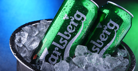POZNAN, POL - NOV 8, 2019: Cans of Carlsberg pale lager beer produced by Carlsberg Group, a Danish brewing company founded in 1847 with headquarters located in Copenhagen, Denmarkのeditorial素材