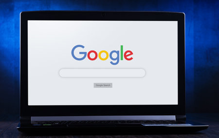 POZNAN, POL - NOV 14, 2019: Laptop computer displaying logo of Google, an American multinational technology company that specializes in Internet-related services and productsのeditorial素材