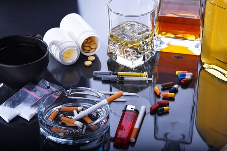 Addictive substances, including alcohol, cigarettes and drugs.の写真素材