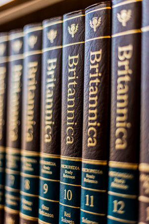 POZNAN, POL - DEC 11, 2019: Encyclopedia Britannica volumes on a shelf in a public libraryのeditorial素材