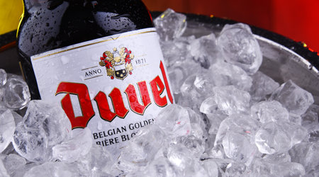 POZNAN, POLAND - JAN 3, 2020: Bottle of Duvel, a flagship beer of Duvel Moortgat Brewery, Flemish brewery founded in 1871 in Belgium.のeditorial素材