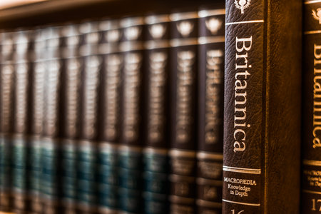 POZNAN, POL - FEB 03, 2020: Encyclopedia Britannica volumes on a shelf in a public libraryのeditorial素材