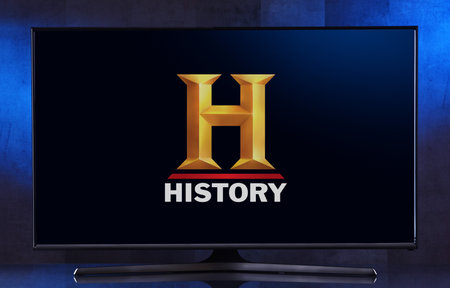 POZNAN, POL - FEB 04, 2020: Flat-screen TV set displaying logo of History, a pay television network that is owned by A+E Networksのeditorial素材