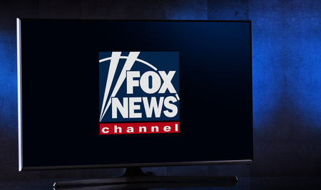 POZNAN, POL - FEB 04, 2020: Flat-screen TV set displaying logo of Fox News, an American conservative...