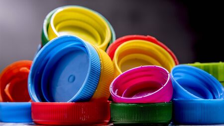 Composition with colorful plastic bottle caps. Recyclingの写真素材