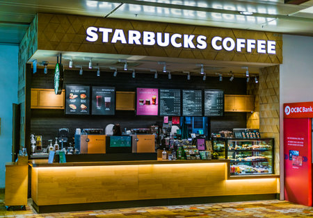 SINGAPORE - MAR 7, 2020: Starbucks coffee shop at Changi Airport in Singaporeのeditorial素材