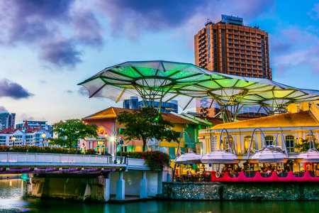 SINGAPORE - MAR 3, 2020: Clarke Quay after sunset, popular nightlife district of Singaporeのeditorial素材
