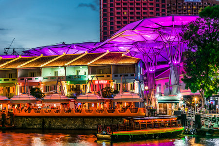 SINGAPORE - MAR 3, 2020: Clarke Quay after sunset, popular nightlife district of Singaporeのeditorial素材