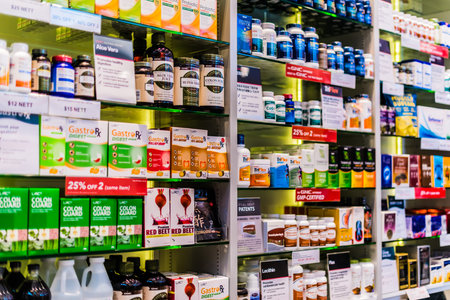 SINGAPORE - MAR 3, 2020: Variety of dietary supplement products on the store shelfのeditorial素材