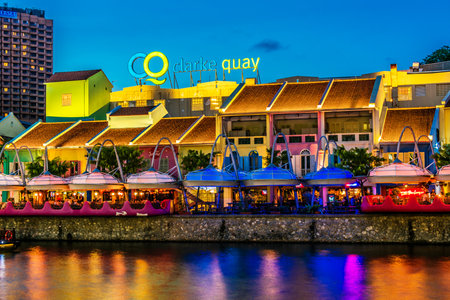 SINGAPORE - MAR 3, 2020: Clarke Quay after sunset, popular nightlife district of Singaporeのeditorial素材