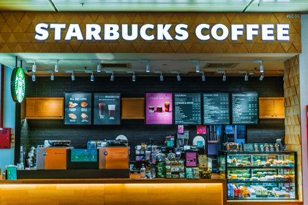 SINGAPORE - MAR 7, 2020: Starbucks coffee shop at Changi Airport in Singaporeのeditorial素材