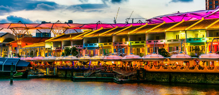 SINGAPORE - MAR 3, 2020: Clarke Quay after sunset, popular nightlife district of Singaporeのeditorial素材
