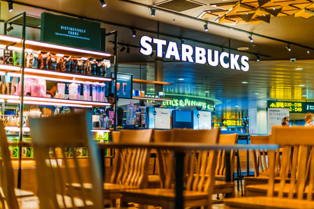 SINGAPORE - MAR 7, 2020: Starbucks coffee shop at Changi Airport in Singaporeのeditorial素材