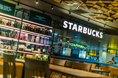 SINGAPORE - MAR 7, 2020: Starbucks coffee shop at Changi Airport in Singaporeのeditorial素材