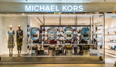 SINGAPORE - MAR 5, 2020: Front entrance to Michael Kors store in Singapore shopping mallのeditorial素材