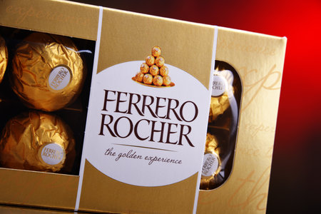 POZNAN, POL - APR 7, 2020: Box of Ferrero Rocher premium chocolate sweets produced by the Italian chocolatier Ferrero SpA., sold in over 40 countries in amount of about 3.6 billion a yearのeditorial素材