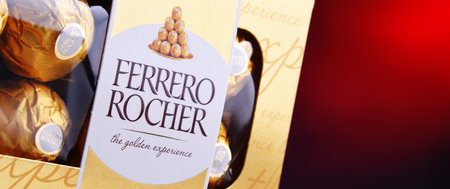 POZNAN, POL - APR 7, 2020: Box of Ferrero Rocher premium chocolate sweets produced by the Italian chocolatier Ferrero SpA., sold in over 40 countries in amount of about 3.6 billion a yearのeditorial素材