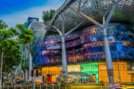 SINGAPORE - MAR 4, 2020: ION Orchard shopping mall in Singapore after sunsetのeditorial素材