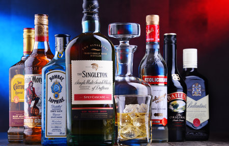 POZNAN, POL - APR 16, 2020: Bottles of assorted global hard  liquor brands including whiskey, vodka, tequila and ginのeditorial素材