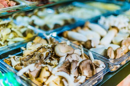 Traditional Asian food ingredients and dishes sold in a singapore restaurantの写真素材