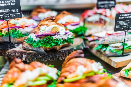 Freshly prepared sandwiches sold in fast food restaurant.の写真素材