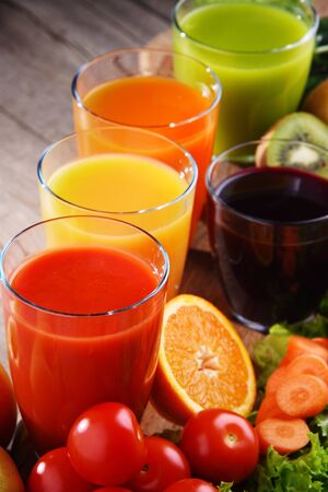 Glasses with fresh organic vegetable and fruit juices. Detox dietの写真素材