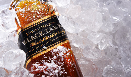 POZNAN, POL - MAY 28, 2020: Bottle of Johnnie Walker, the most widely distributed brand of blended Scotch whisky in the world with sales of over 130 million bottles a year.のeditorial素材