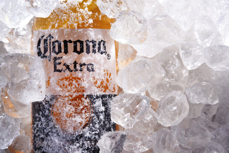 POZNAN, POL - MAY 22, 2020: Bottle of Corona Extra, one of the top-selling beers worldwide, a pale lager produced by Cerveceria Modelo in Mexicoのeditorial素材