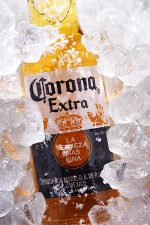 POZNAN, POL - MAY 22, 2020: Bottle of Corona Extra, one of the top-selling beers worldwide, a pale lager produced by Cerveceria Modelo in Mexicoのeditorial素材