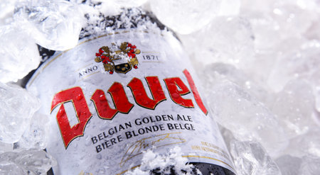POZNAN, POL - JUN 10, 2020: Bottle of Duvel, a flagship beer of Duvel Moortgat Brewery, Flemish brewery founded in 1871 in Belgium.のeditorial素材